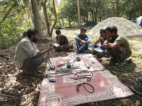 A Rocha volunteer educating students about various devices that are used to track the path of elephants (Picture: A Rocha India)