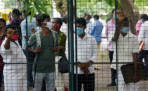 Students wait at the counselling centre at Jawaharlal Nehru Stadium (Pic: Express/Sathish Babu)