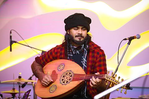 Bonny Abraham playing Oud