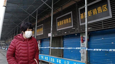 China reports 21 new COVID-19 cases, Wuhan steps up mass testing for infections 