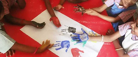 Children at the school painting