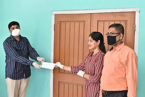 Rima donating the money (Pic: Sourced)