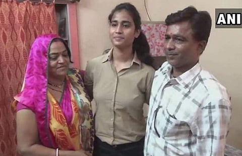 Aanchal Gangwal with her parents. Credit: ANI