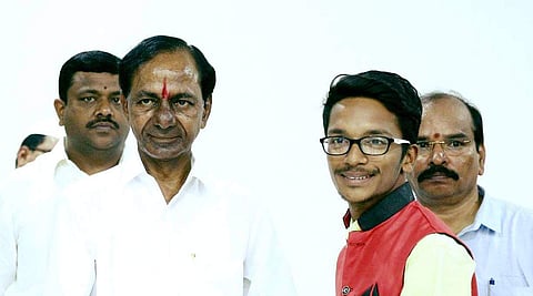 Akshay with Telangana's CM KCR | (Pic: Literacy Helping Hands)