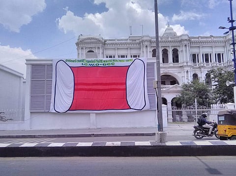 The cloth mask banner outside Rippon Building| Pic: ICWO