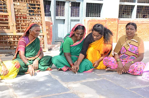 Sudha Muttal help women read and write Kannada