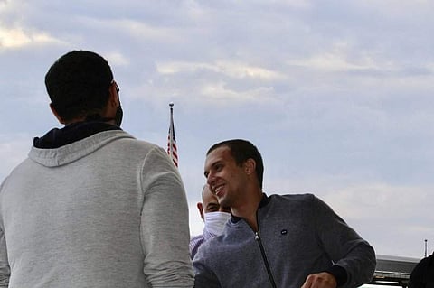 e Mohamed Amashah is greeted by family members  (Pic: AP)