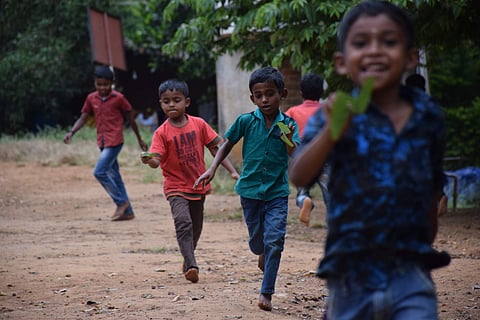 Children playing with the leaf Kathaadi| Pic: Deepak and Maya