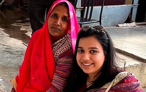 With a woman from SHGs | (Pic: Vigyanit Foundation)