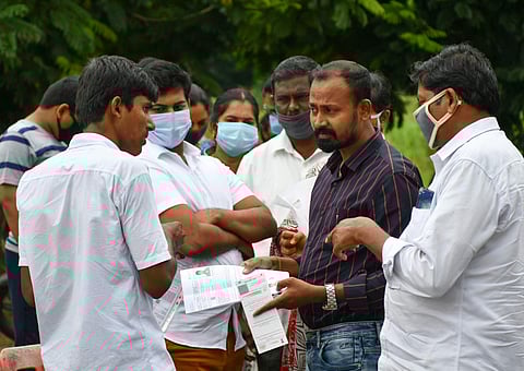 Norms flouted outside an exam centre in Vijaywada, Andhra Pradesh (Pic: Prasant Madugula)