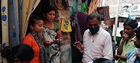 Ajay Arya interacting with children and their parents in an East Delhi slum (Pics: Ajay Arya)