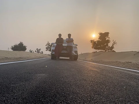 The couple eats, sleeps and explores new cities in their car