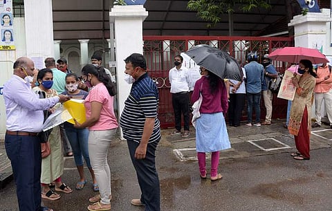 Students waiting outside a NEET centre in Chennai on Sunday | Pic: EPS