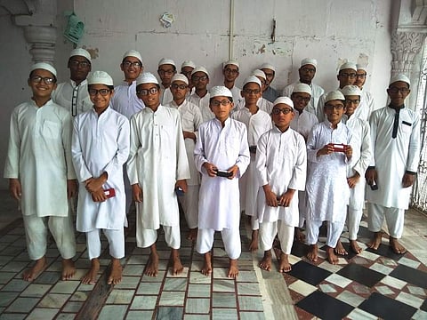 Representative image of students in a madrassa