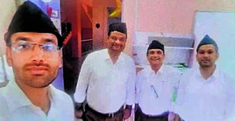 The viral photo of University of Karnataka lecturers in RSS uniform | Pic: IANS