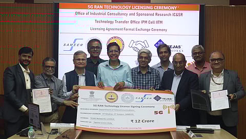IIT Madras, IIT Kanpur and SAMEER officials display the cheque replica | (Pic: IIT Madras)