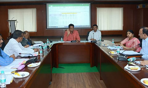 Picture of Karnataka's Higher Education Minister Dr MC Sudhakar in a meeting with the Undersecretaries of Administration and Evaluation of all the Universities